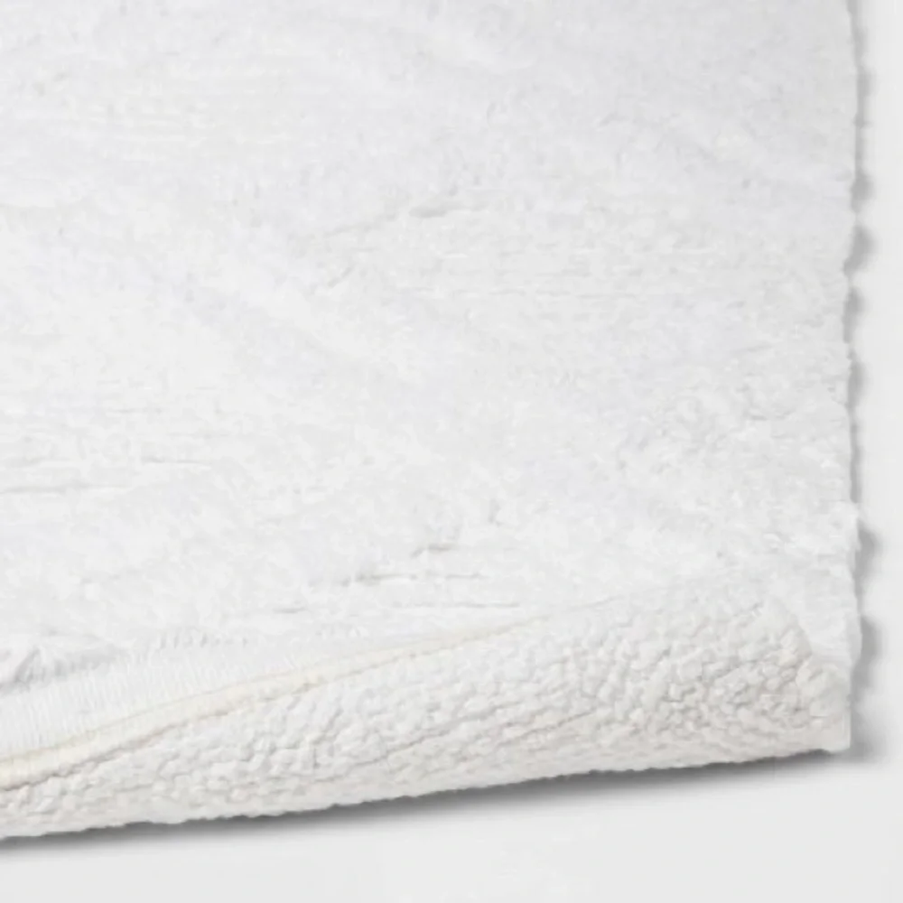 Threshold Diamond Embossed Tasseled Woven Bath Rug White 20 x 36”